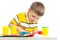 Kid playing colorful clay toy