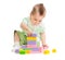 Kid playing colorful toy building blocks