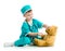 Kid playing doctor with plush toy