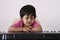 Kid playing a keyboard