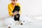 Kid playing with little dogs at home. Little girl with the puppies. Adorable child playing with pets at the carpet in the room