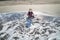 Kid playing sand in Nato Beach in the Philippines