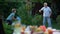 Kid playing throw and catch game with grandfather, active lifestyle, having fun