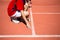 Kid runing on track in the Stadium