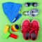 Kid\'s street outfit and some toys on white background.