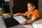 Kid self isolation using tablet for his homework. Online education