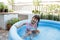 Kid swim in inftable pool