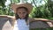 Kid Swinging in Courtyard, Child Playing Outdoor in Nature, Thoughtful Girl Relaxing at Playground, Smiling Blonde Girl Portrait