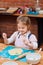 Kid taking part in baking workshop