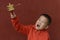 kid turning prayer wheel