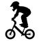 Kids balance bicycle, child performs a trick on a bike, silhouette vector