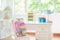 Kids bedroom with wooden desk and doll house
