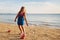 Kids blow bubble at beach. Child with bubbles