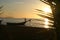 Kids and boat in sunset