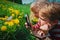 Kids - boy and girl - looking at butterfy, kids learning nature