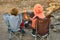 Kids burning a fire at camping ground