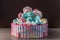 Kids cake decorated with Teddy bear and colorful meringues, marshmallows. Concept of desserts for the birthday children