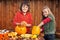 Kids carving their pumpkin jack-o-lanterns