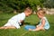 Kids catching butterflies on natural background