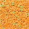 Kids cereal generic apple jacks orange and green puffed circle shaped