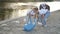 Kids collecting trash volunteer teamwork a child group happy family on collects garbage plastic trash waste bottles