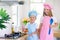 Kids cook in white kitchen. Children cooking