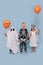 Kids in costumes ghost, skeleton and dead bride ready for halloween holiday