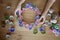 Kids create Easter flower wreath in pastel colors using an upcycled egg trail. Zero waste lifestyle