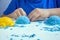 Kids creativity. Kinetic sand games for child development at home. Sand therapy. Children`s hands making moldes. Selective focus,