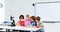 Kids doing a chemical experiment in laboratory