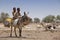 Kids on a donkey in Africa