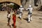 Kids dressed up as Star Wars characters chase off Storm Troopers at Disney World`s Galaxy`s Edge at Hollywood Studios