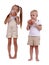 Kids eating pastry isolated on a white background. Cute brother and sister eating cinnamon buns. Homemade pastry concept