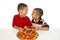Kids eating pizza