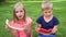 Kids eating watermelon outdoors