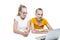 Kids Educational Concepts. Two Caucasian Teenager Twins With Laptop Against White, Demonstrating Distant Education Process