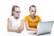 Kids Educational Concepts. Two Caucasian Teenager Twins With Laptop Against White, Demonstrating Remote Education Process