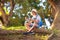 Kids explore nature. Children hike in sunny park