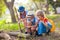 Kids explore nature. Children hike in sunny park