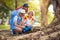 Kids explore nature. Children hike in sunny park