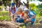 Kids explore nature. Children hike in sunny park