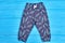 Kids feather print autumn pants.