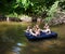 Kids floating on the river
