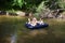 Kids floating on the river