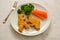 Kids food. nuggets with vegetables. Dinosaur shaped chicken, fish or turkey nuggets, ready to eat