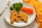Kids food. nuggets with vegetables. Dinosaur shaped chicken, fish or turkey nuggets, ready to eat