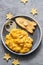 Kids funny breakfast with scrambled eggs, cheese and tortilla rocket