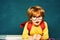 Kids gets ready for school. Learning concept. First school day. Happy smiling pupils drawing at the desk. School kids