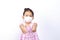 Kids girl wearing mask for protect pm2.5 and show great hand for fight corona virus concept on white backgrounds