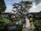 Kids going to fish, with wooden traditional thai house, stilt house, Thailand fisherman village and landscape